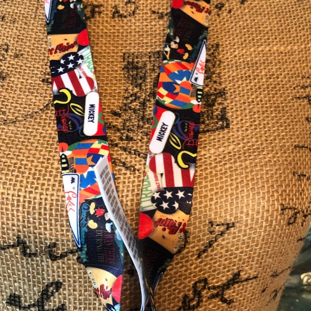 Authentic New with tag. Disney Multicolor Mickey Mouse Pin Lanyard